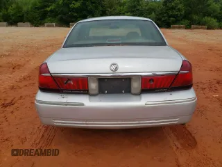 1999 Mercury Grand Marquis LS z VIN 2MEFM75W3XX617388, wystawiony jako Copart lot #58811195 z przebiegiem 162 600 mil mil oraz Szkoda całkowita • Salvage title. Historia ofert i sprzedaży dostępna na DreamBid. Obrazek 6.