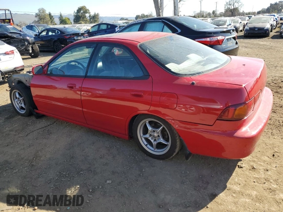 1996 Acura Integra with VIN JH4DB7554TS003693, listed as a Copart auction lot 43013745 with 180,608 mi miles and Salvage title. Bid and sale history available at DreamBid. Image 2.
