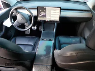 2020 Tesla Model Y Long Range z VIN 5YJYGDEE3LF011297, wystawiony jako Copart lot #42711345 z przebiegiem 103 803 mil mil oraz Szkoda całkowita • Salvage title. Historia ofert i sprzedaży dostępna na DreamBid. Obrazek 8.