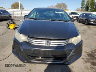 2010 Honda Insight LX with VIN JHMZE2H50AS009869, listed as a Copart auction lot 53031515 with 194,860 mi miles and Salvage Title. Bid and sale history available at DreamBid. Image 5.