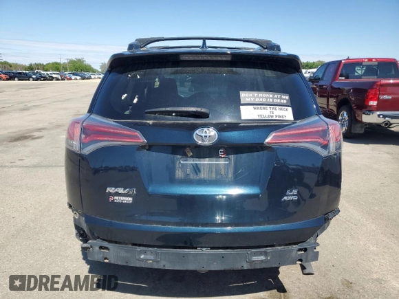 2017 Toyota RAV4 LE with VIN JTMBFREVXHJ700923, listed as a Copart auction lot 52887645 with 119,528 mi miles and Salvage title. Bid and sale history available at DreamBid. Image 6.
