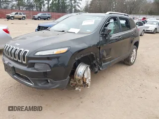 2014 Jeep Cherokee Limited with VIN 1C4PJLDSXEW279356, listed as a IAAI auction lot 41533158 with 115,117 mi miles. Bid and sale history available at carsss.com. Image 18.