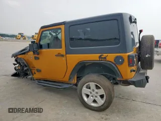 2014 Jeep Wrangler Sport z VIN 1C4AJWAG7EL181121, wystawiony jako Copart lot #42599235 z przebiegiem 130 721 mil mil oraz Szkoda całkowita • Salvage title. Historia ofert i sprzedaży dostępna na DreamBid. Obrazek 2.