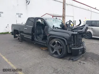 2014 GMC Sierra 1500 SLT with VIN 1GTV2VEC1EZ331057, listed as a IAAI auction lot 40987534 with 1 mi miles. Bid and sale history available at carsss.com. Image 1.