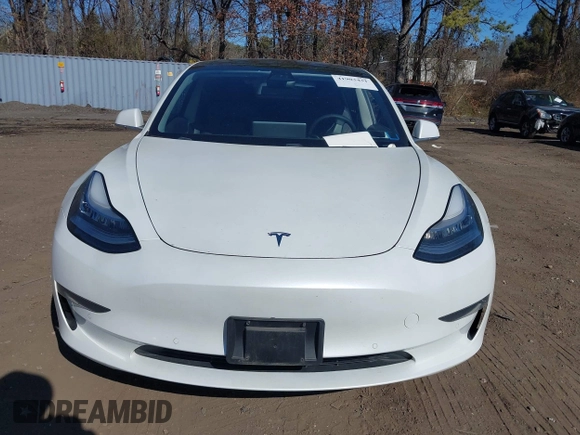 2020 Tesla Model 3 Standard Range Plus with VIN 5YJ3E1EA0LF783672, listed as a IAAI auction lot 41903431 with 52,157 mi miles and . Bid and sale history available at carsss.com. Image 12.