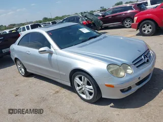 2007 Mercedes-Benz CLK-Class 3.5L with VIN WDBTJ56H27F218970, listed as a IAAI auction lot 42054097 with 124,906 mi miles. Bid and sale history available at carsss.com. Image 1.