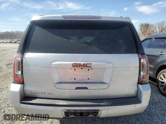 2018 GMC Yukon XL SLT with VIN 1GKS1GKCXJR328985, listed as a Copart auction lot 49485935 with 114,927 mi miles and Salvage Title. Bid and sale history available at carsss.com. Image 6.