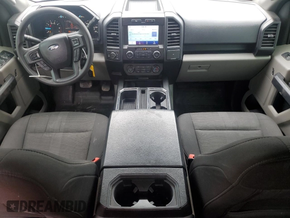 2019 Ford F-150 XL with VIN 1FTEX1EP9KKC47098, listed as a Copart auction lot 60653275 with 104,823 mi miles and Salvage title. Bid and sale history available at DreamBid. Image 8.