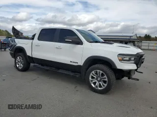2020 Ram 1500 Rebel with VIN 1C6SRFLM1LN230872, listed as a Copart auction lot 55671585 with 97,202 mi miles and Salvage title. Bid and sale history available at DreamBid. Image 4.