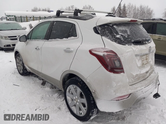 2019 Buick Encore Essence with VIN KL4CJGSM5KB738932, listed as a Copart auction lot 83087444 with 59,162 mi miles and Salvage Title. Bid and sale history available at DreamBid. Image 2.