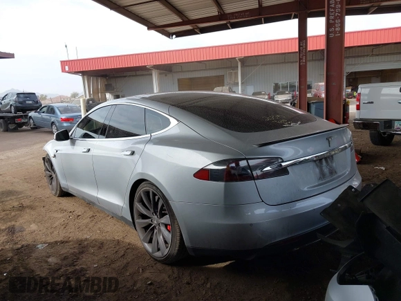2014 Tesla Model S 60 with VIN 5YJSA1H17EFP35351, listed as a IAAI auction lot 41558434 with 151,002 mi miles and . Bid and sale history available at DreamBid. Image 3.