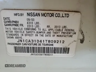2001 Nissan Maxima GXE with VIN JN1CA31D41T809212, listed as a Copart auction lot 57845405 with 244,502 mi miles and Salvage title. Bid and sale history available at DreamBid. Image 12.
