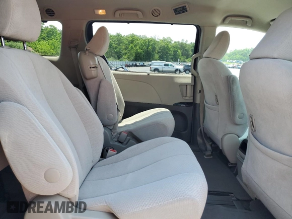 2013 Toyota Sienna LE AAS with VIN 5TDKK3DC4DS404544, listed as a Copart auction lot 60274615 with 94,933 mi miles and Salvage title. Bid and sale history available at DreamBid. Image 11.