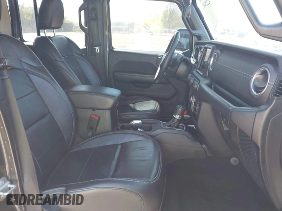 2018 Jeep Wrangler Unlimited Sahara with VIN 1C4HJXEG0JW166645, listed as a IAAI auction lot 42228492 with 58,416 mi miles and . Bid and sale history available at DreamBid. Image 5.