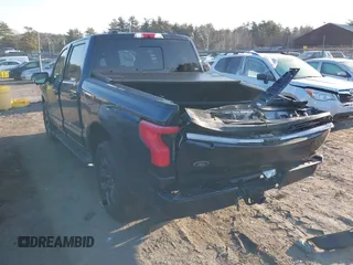2023 Ford F-150 Lightning Pro with VIN 1FT6W1EV7PWG33511, listed as a IAAI auction lot 41761149 with 10,501 mi miles and . Bid and sale history available at DreamBid. Image 3.