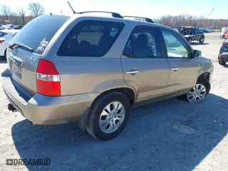2003 Acura MDX Touring Pkg with VIN 2HNYD18623H549599, listed as a IAAI auction lot 41879934 with 242,896 mi miles. Bid and sale history available at carsss.com. Image 4.