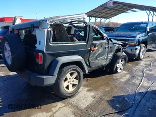 2017 Jeep Wrangler Sport with VIN 1C4GJWAG9HL567022, listed as a IAAI auction lot 40900310 with 81,196 mi miles and . Bid and sale history available at DreamBid. Image 4.