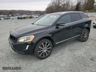 2015 Volvo XC60 T5 Drive-E Platinum with VIN YV440MDM9F2658741, listed as a Copart auction lot 41989005 with 128,503 mi miles and Salvage Title. Bid and sale history available at carsss.com. Image 1.