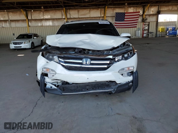 2018 Honda Pilot Touring с VIN 5FNYF6H98JB053524, выставлен на аукционе Copart как лот 61447785 с пробегом 114 942 миль миль и Списание • Salvage title. История ставок и продаж доступна на DreamBid. Изображение 5.