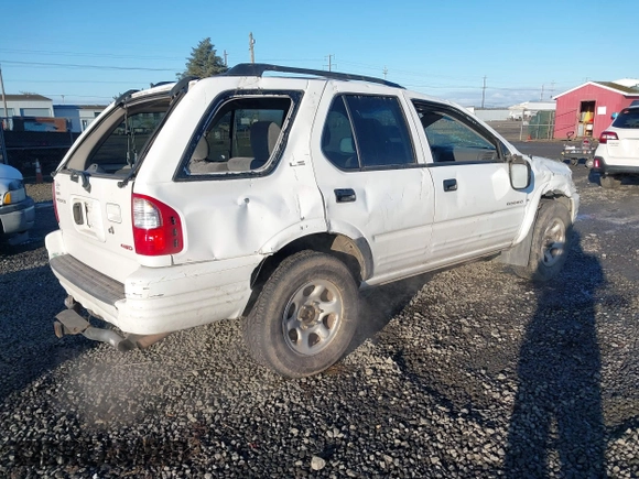 2001 Isuzu Rodeo S with VIN 4S2DM58W014335513, listed as a IAAI auction lot 41529329 with 173,891 mi miles and . Bid and sale history available at DreamBid. Image 4.