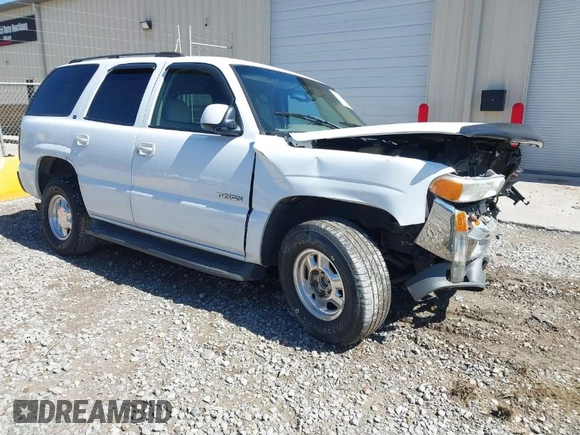 2003 GMC Yukon SLT with VIN 1GKEC13Z33R171861, listed as a IAAI auction lot 41739226 with 230,139 mi miles. Bid and sale history available at carsss.com. Image 1.