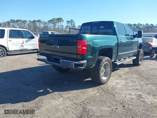 2015 Chevrolet Silverado 1500 LTZ with VIN 3GCUKSEC1FG173590, listed as a IAAI auction lot 41700436 with 117,102 mi miles. Bid and sale history available at carsss.com. Image 4.