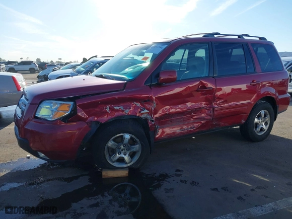 2006 Honda Pilot EX-L with RES with VIN 2HKYF186X6H509492, listed as a IAAI auction lot 41831784 with 228,948 mi miles. Bid and sale history available at carsss.com. Image 6.