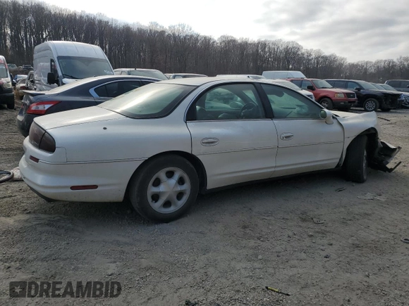 1999 Oldsmobile Aurora with VIN 1G3GR62C4X4112642, listed as a Copart auction lot 48176035 with 100,342 mi miles and Salvage Title. Bid and sale history available at DreamBid. Image 3.