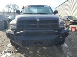 1999 Dodge 1500 with VIN 1B7HF13Z1XJ622564, listed as a Copart auction lot 42615515 with 242,904 mi miles and Salvage title. Bid and sale history available at DreamBid. Image 5.