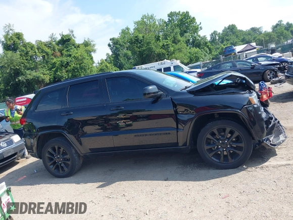 2018 Jeep Grand Cherokee Upland with VIN 1C4RJFAG2JC350975, listed as a IAAI auction lot 42612836 with 148,435 mi miles and . Bid and sale history available at DreamBid. Image 13.