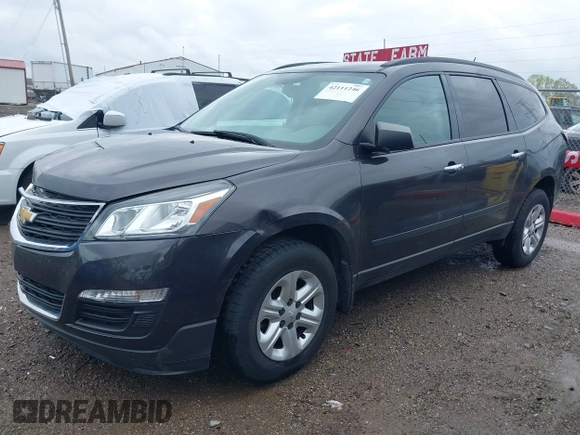 2015 Chevrolet Traverse LS z VIN 1GNKRFKDXFJ107942, wystawiony jako IAAI lot #42111246 z przebiegiem 128 036 mil mil oraz . Historia ofert i sprzedaży dostępna na DreamBid. Obrazek 2.