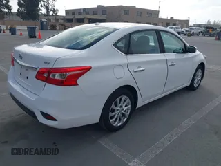 2017 Nissan Sentra SV with VIN 3N1AB7AP6HY314758, listed as a IAAI auction lot 42082152 with 123,718 mi miles and . Bid and sale history available at DreamBid. Image 4.
