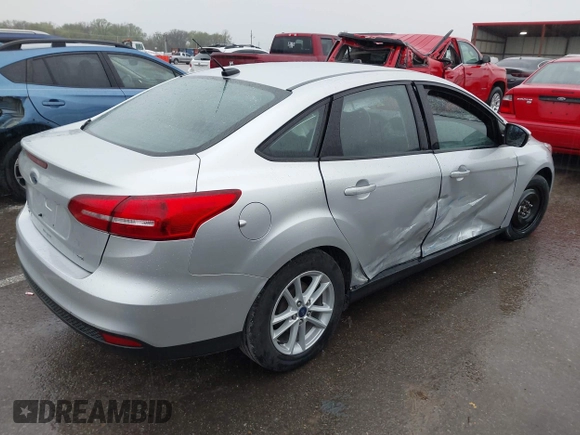 2017 Ford Focus SE with VIN 1FADP3F24HL303600, listed as a IAAI auction lot 41948159 with 95,212 mi miles and . Bid and sale history available at DreamBid. Image 4.