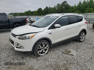 2014 Ford Escape Titanium с VIN 1FMCU0J90EUC64975, выставлен на аукционе Copart как лот 54770665 с пробегом 149 924 миль миль и Списание • Salvage title. История ставок и продаж доступна на DreamBid. Изображение 1.