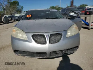 2006 Pontiac G6 1SV z VIN 1G2ZF55B164196954, wystawiony jako Copart lot #52812255 z przebiegiem Nie podano mil oraz Szkoda całkowita • Salvage title. Historia ofert i sprzedaży dostępna na DreamBid. Obrazek 5.