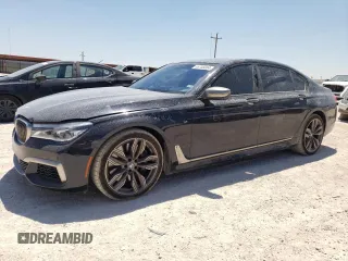 2018 BMW 7 Series M760i xDrive with VIN WBA7H6C51JG614580, listed as a Copart auction lot 65748304 with 46,801 mi miles and Clean Title. Bid and sale history available at carsss.com. Image 1.