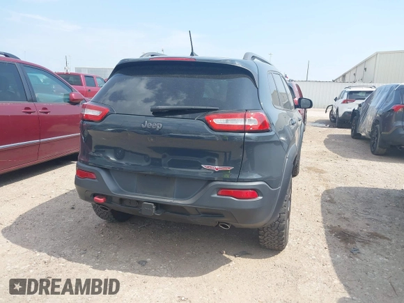 2016 Jeep Cherokee Trailhawk z VIN 1C4PJMBS0GW300131, wystawiony jako IAAI lot #42439009 z przebiegiem 173 571 mil mil oraz . Historia ofert i sprzedaży dostępna na DreamBid. Obrazek 16.