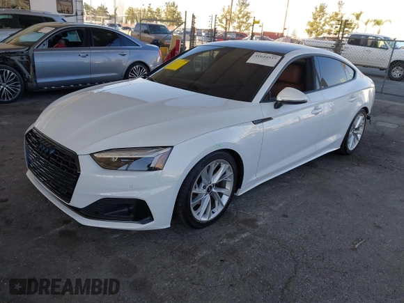 2023 Audi A5 Sportback Premium z VIN WAUABCF5XPA056452, wystawiony jako IAAI lot #41644537 z przebiegiem 14 918 mil mil oraz . Historia ofert i sprzedaży dostępna na DreamBid. Obrazek 18.