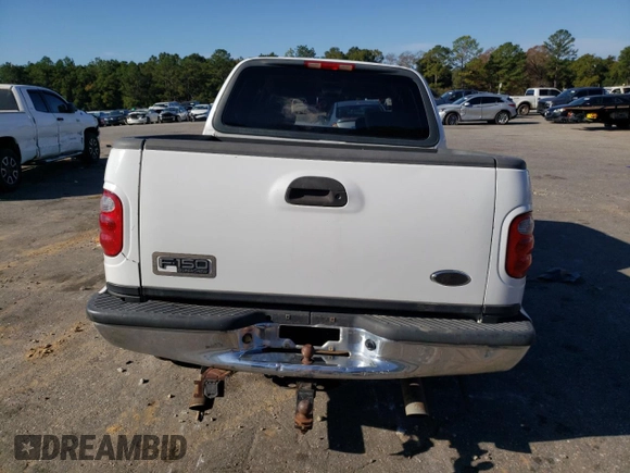 2002 Ford F-150 XLT with VIN 1FTRW07L42KB90527, listed as a Copart auction lot 85098244 with 143,213 mi miles and Salvage Title. Bid and sale history available at carsss.com. Image 6.