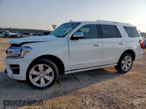 2023 Ford Expedition Platinum z VIN 1FMJU1L88PEA35667, wystawiony jako Copart lot #59357185 z przebiegiem Nie podano mil oraz Szkoda całkowita • Salvage title. Historia ofert i sprzedaży dostępna na DreamBid. Obrazek 1.