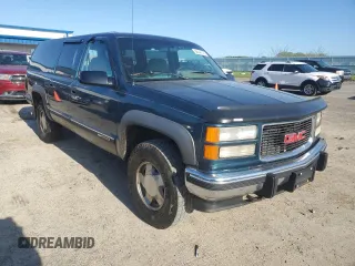 1994 GMC Suburban z VIN 1GKFK16K4RJ754534, wystawiony jako Copart lot #56044145 z przebiegiem 224 747 mil mil oraz Nie do naprawy • Non repairable. Historia ofert i sprzedaży dostępna na DreamBid. Obrazek 4.