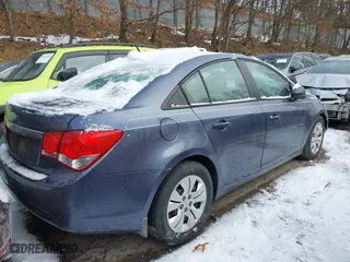 2014 Chevrolet Cruze LS with VIN 1G1PB5SG7E7142059, listed as a IAAI auction lot 41435050 with 106,067 mi miles. Bid and sale history available at carsss.com. Image 4.