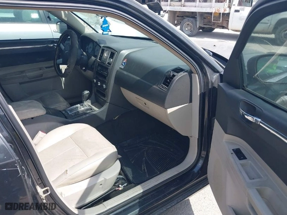 2006 Chrysler 300 Touring with VIN 2C3KA53G66H212129, listed as a IAAI auction lot 41868973 with 248,340 mi miles. Bid and sale history available at carsss.com. Image 5.