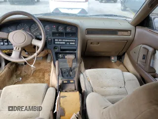 1986 Toyota Supra z VIN JT2MA70L3G0009411, wystawiony jako Copart lot #87545755 z przebiegiem 151 108 mil mil oraz Czysty tytuł • Clean title. Historia ofert i sprzedaży dostępna na DreamBid. Obrazek 8.