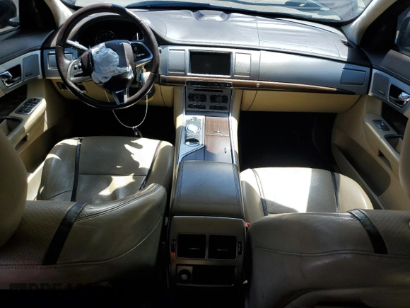 2015 Jaguar XF V6 Portfolio with VIN SAJWA0F79F8U60216, listed as a Copart auction lot 54969245 with 88,954 mi miles and Salvage Title. Bid and sale history available at carsss.com. Image 8.