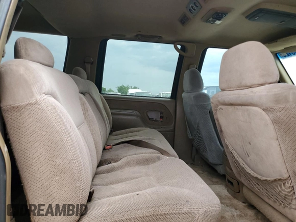 1995 GMC Suburban z VIN 1GKEC16K9SJ708907, wystawiony jako Copart lot #56415125 z przebiegiem 251 343 mil mil oraz Szkoda całkowita • Salvage title. Historia ofert i sprzedaży dostępna na DreamBid. Obrazek 11.