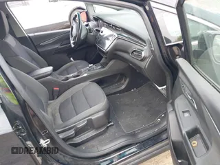 2023 Chevrolet Bolt EV 1LT with VIN 1G1FW6S04P4126205, listed as a IAAI auction lot 42190240 with 68,805 mi miles and . Bid and sale history available at DreamBid. Image 5.