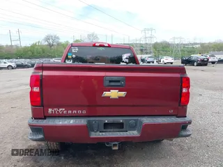 2017 Chevrolet Silverado 1500 LT with VIN 3GCUKREC5HG319937, listed as a IAAI auction lot 42073970 with 99,219 mi miles and . Bid and sale history available at DreamBid. Image 17.