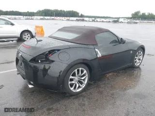 2010 Nissan 370Z Touring with VIN JN1AZ4FH7AM304809, listed as a IAAI auction lot 39876962 with 66,418 mi miles. Bid and sale history available at carsss.com. Image 4.
