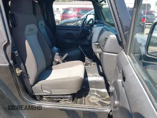 2005 Jeep Wrangler X with VIN 1J4FA39S35P372731, listed as a IAAI auction lot 41875121 with 146,034 mi miles and . Bid and sale history available at DreamBid. Image 5.